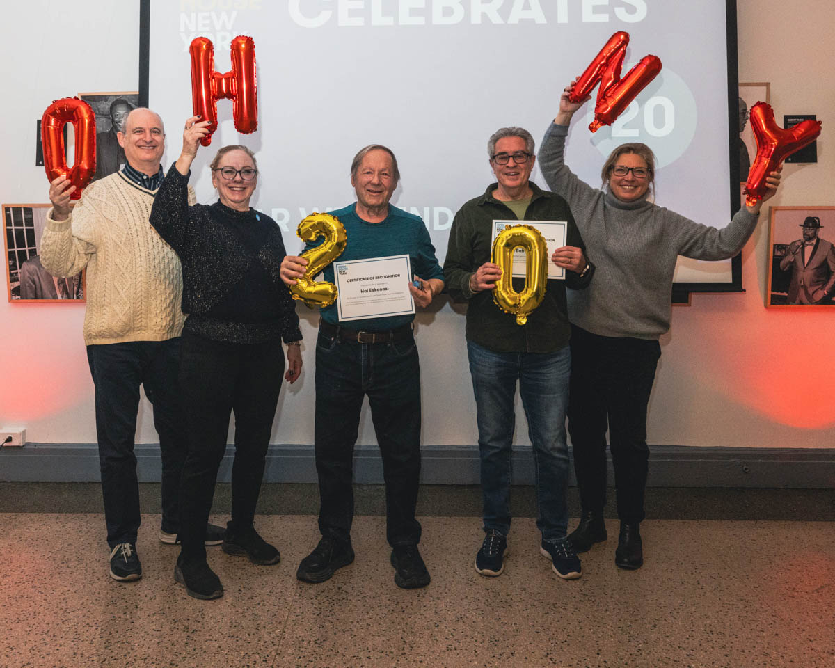 A group of five people holding balloons that read "OHNY 20".